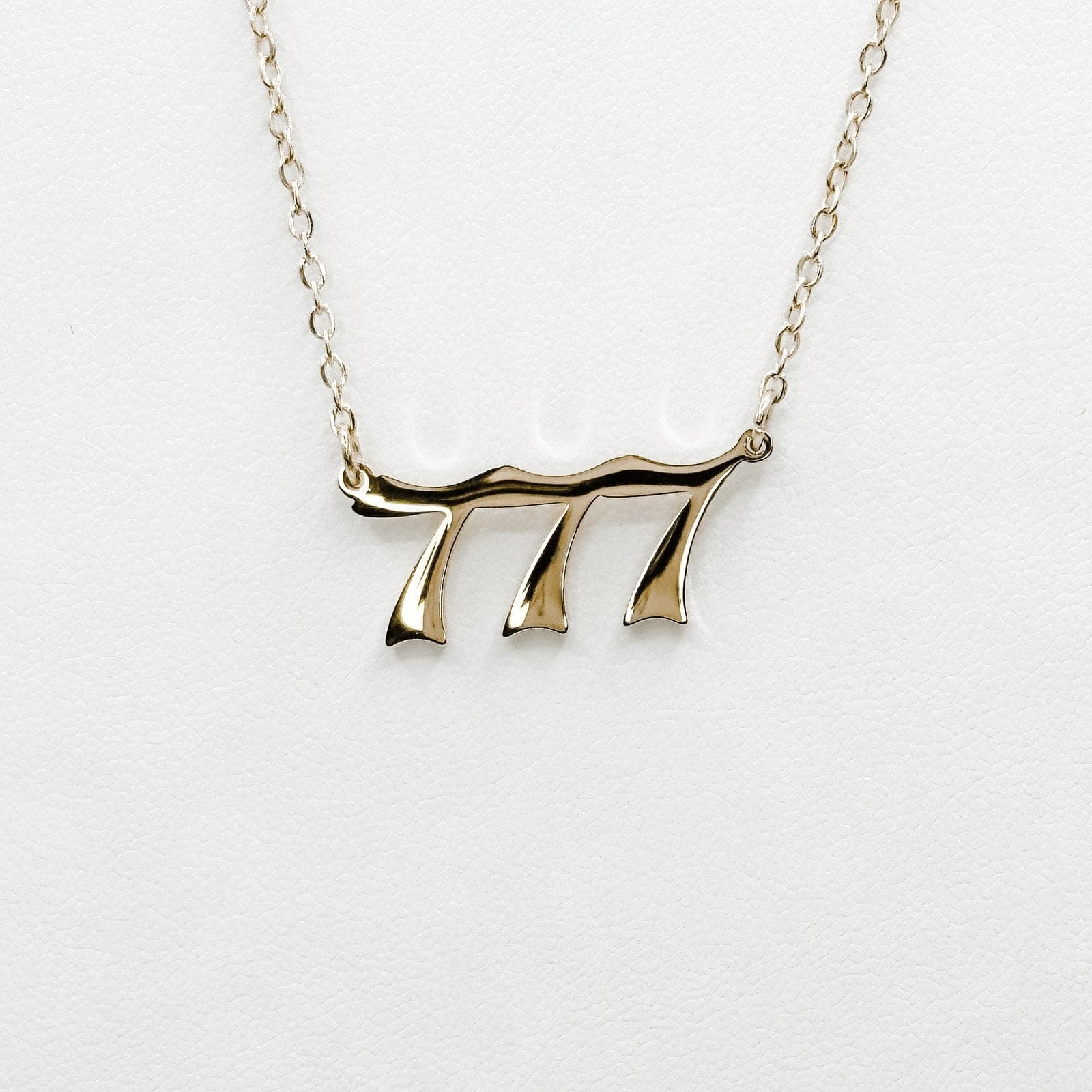 gold  plated 777 necklace