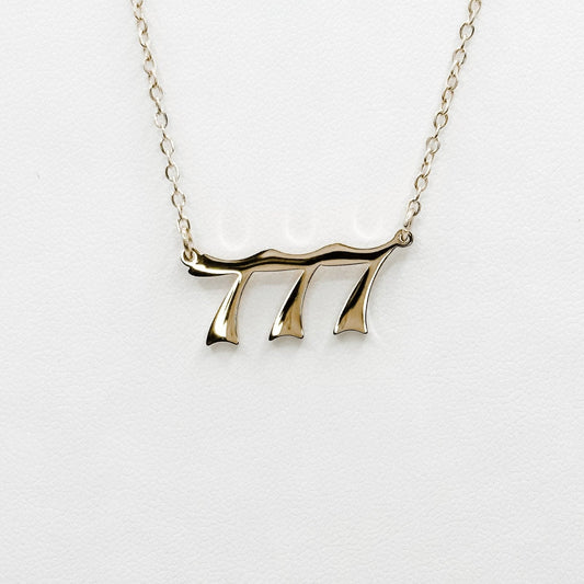 gold  plated 777 necklace